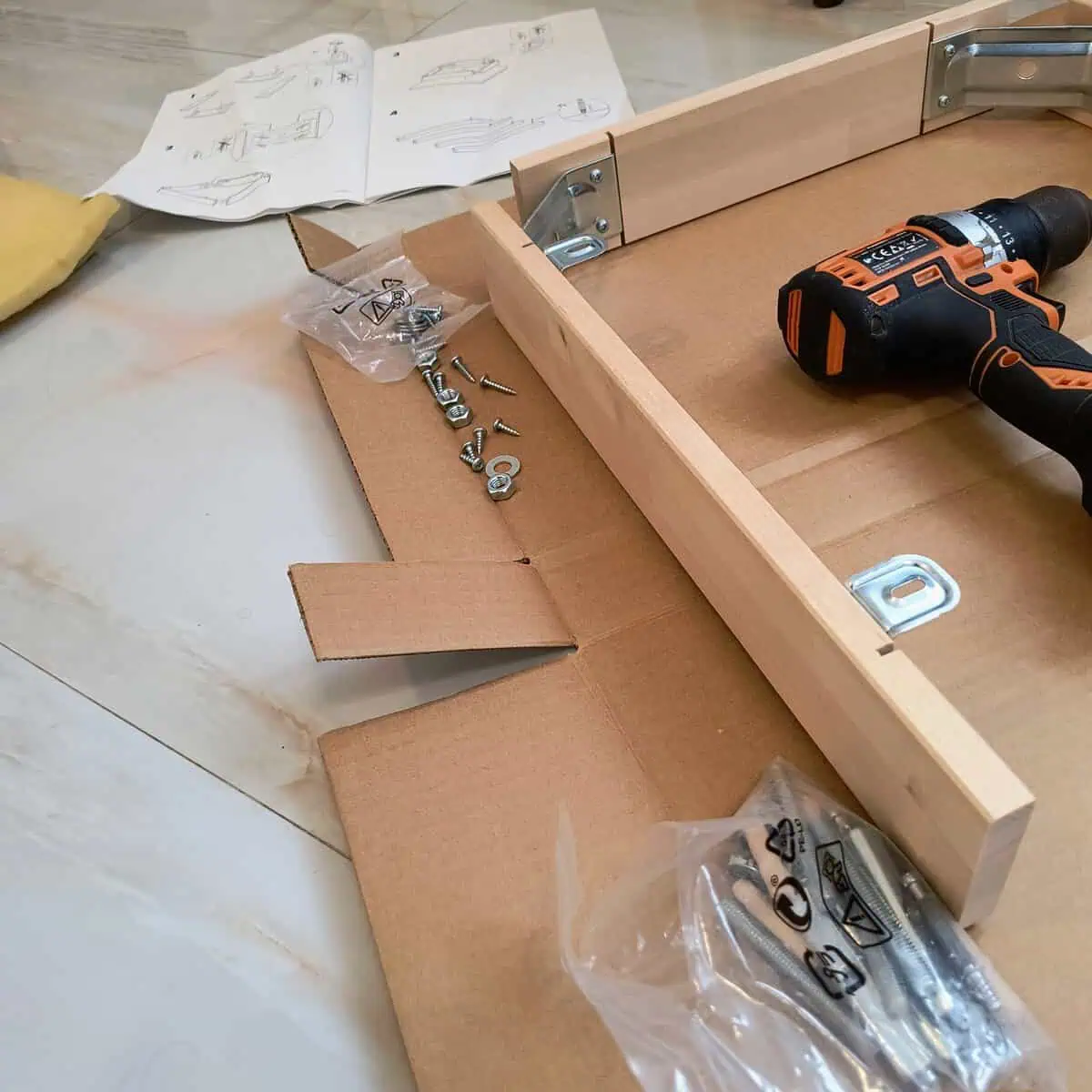 Master assembles a rolling kitchen cart frame in Tbilisi